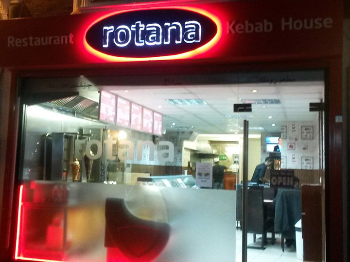 Illuminated perspex restaurant sign