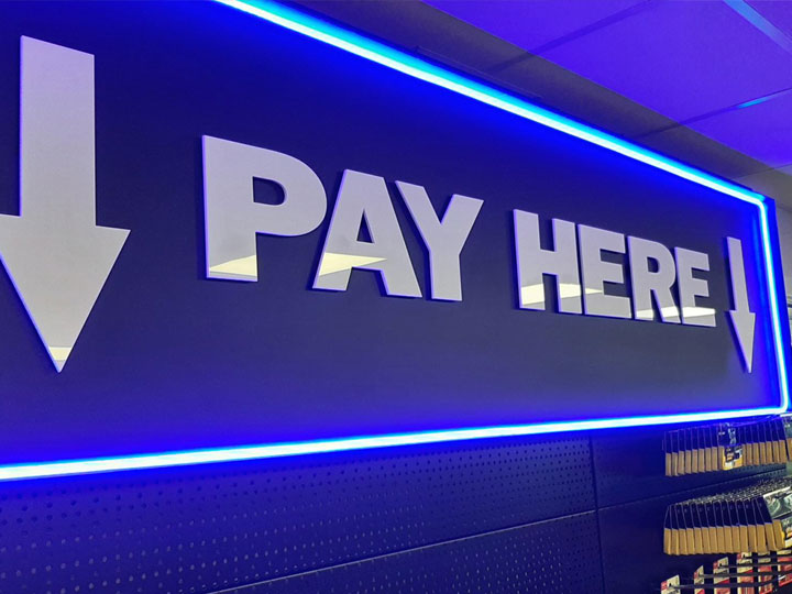 Pay here signage