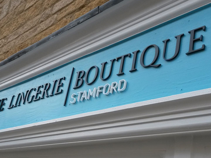 Perspex letters on wood fascia sign